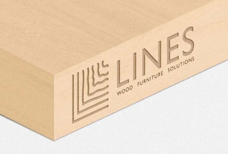 Lines logo engraved on wood