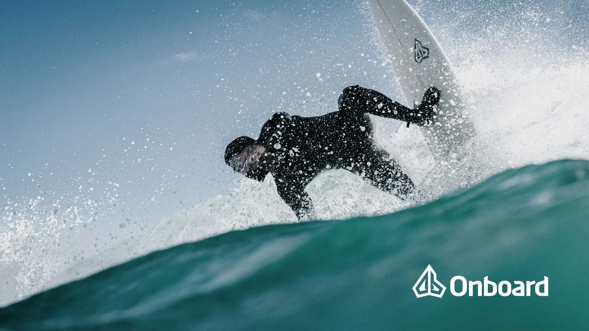 Surfer surfing with an Onboard Surfboard in ericeira